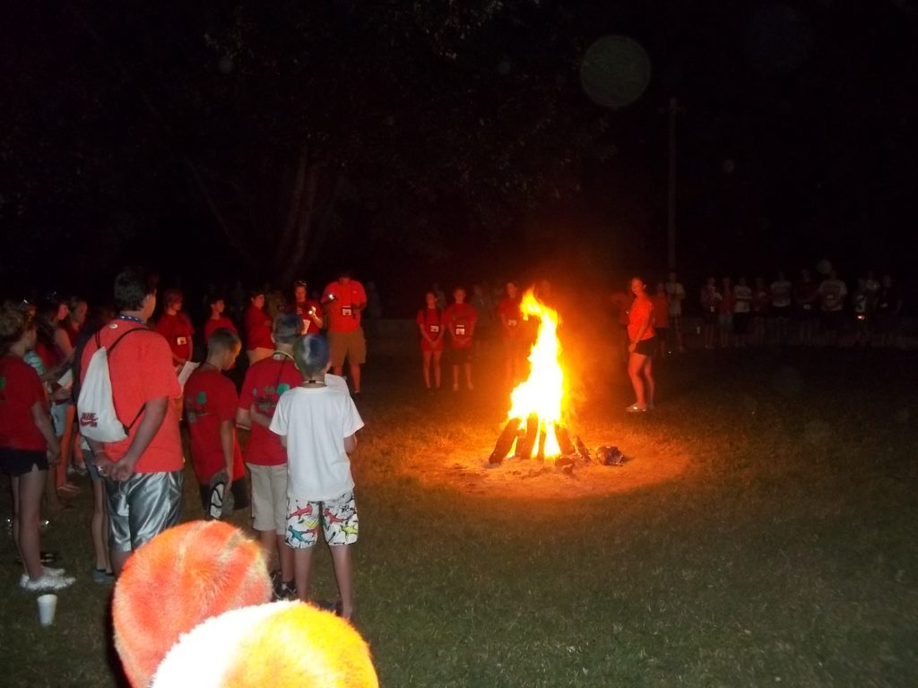 4-Hers at a Summer Camp fire gathering